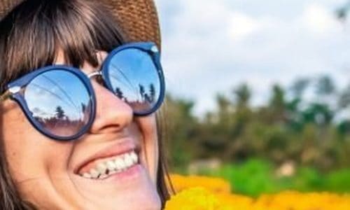 A good habit to grow is being out in nature more. Clear from the smiling woman in a field of sunflowers